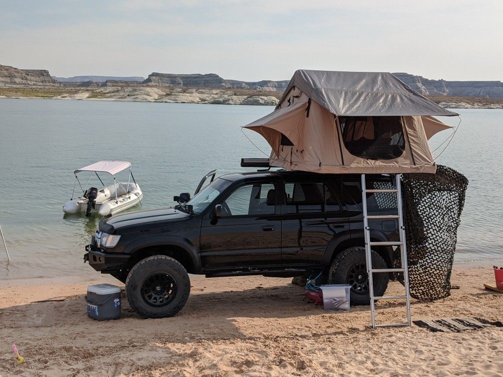 cheap land cruiser tx hire Uganda with a rooftop tent