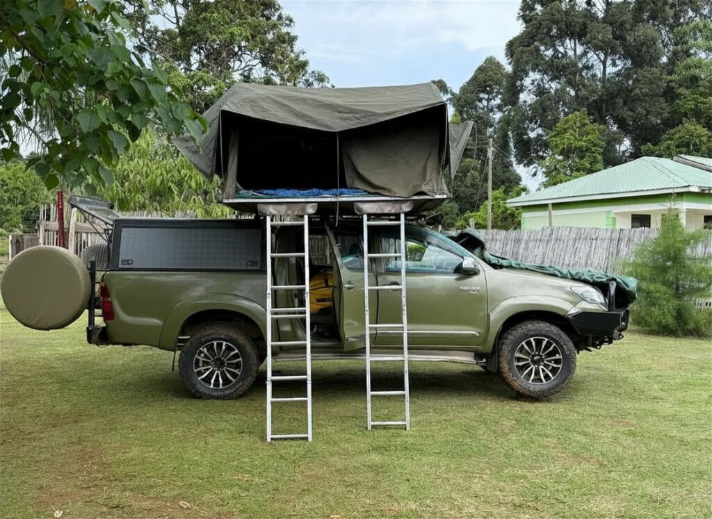 cheap Toyota Hilux with family rooftop tent in Uganda