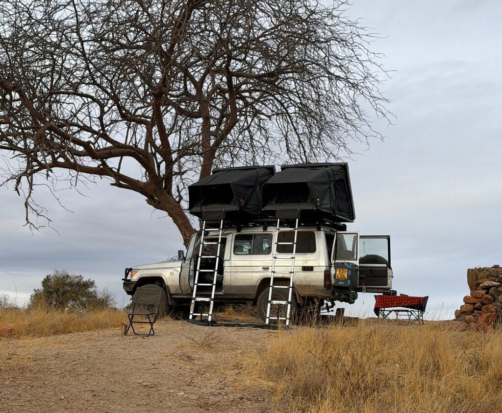 Rent a reliable 4x4 70 series land Cruiser Hardtop with rooftop tent in Uganda